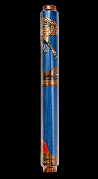 FLIGHT OF THE CRANES - Maki-e fountain pen, is a superbly crafted, unique depiction of a pair of Cranes flying above the golden glow of an infinite cerulean sky welcoming the transition of night into dawn.